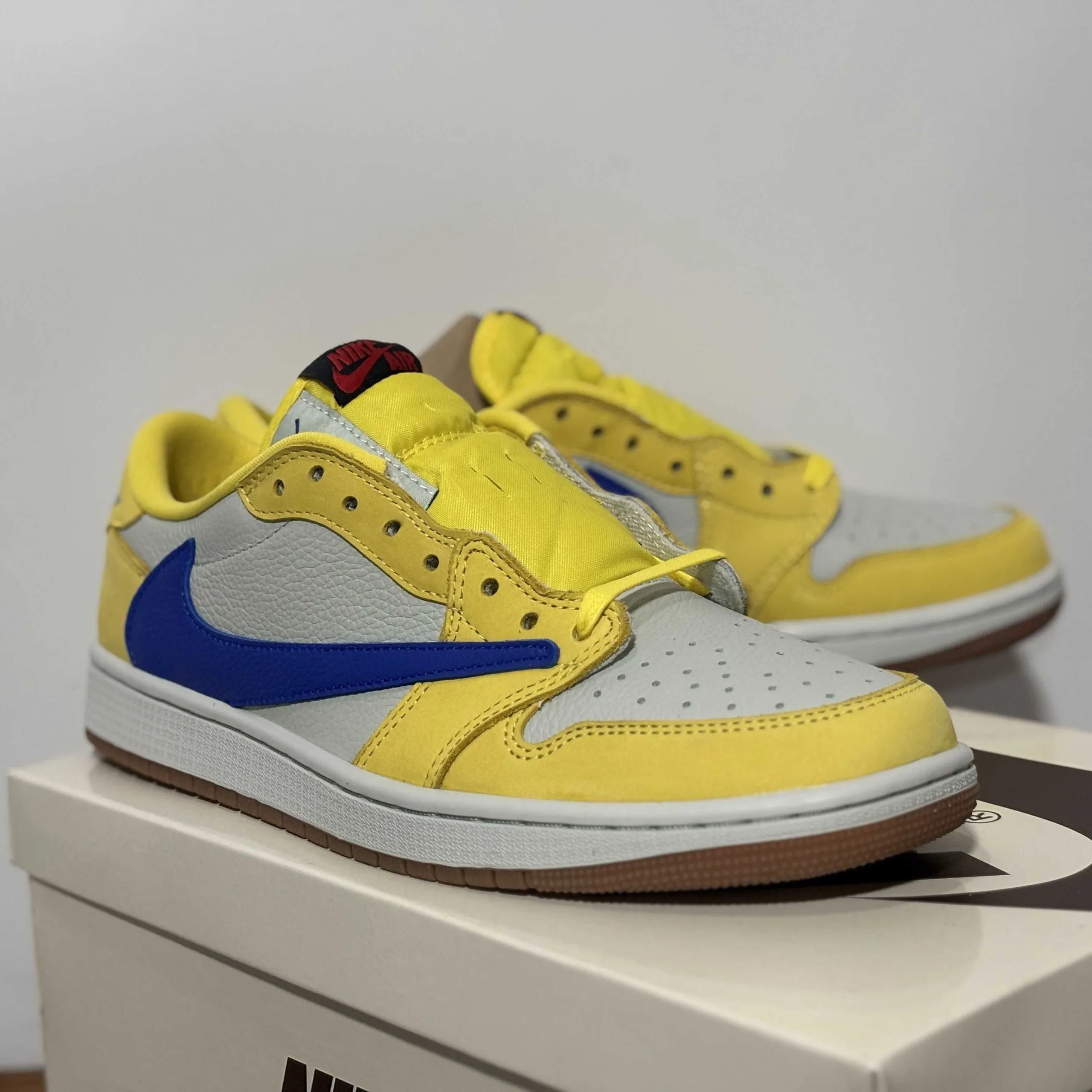 AJ1 Reverse Swoosh Yellow and Blue UA Version